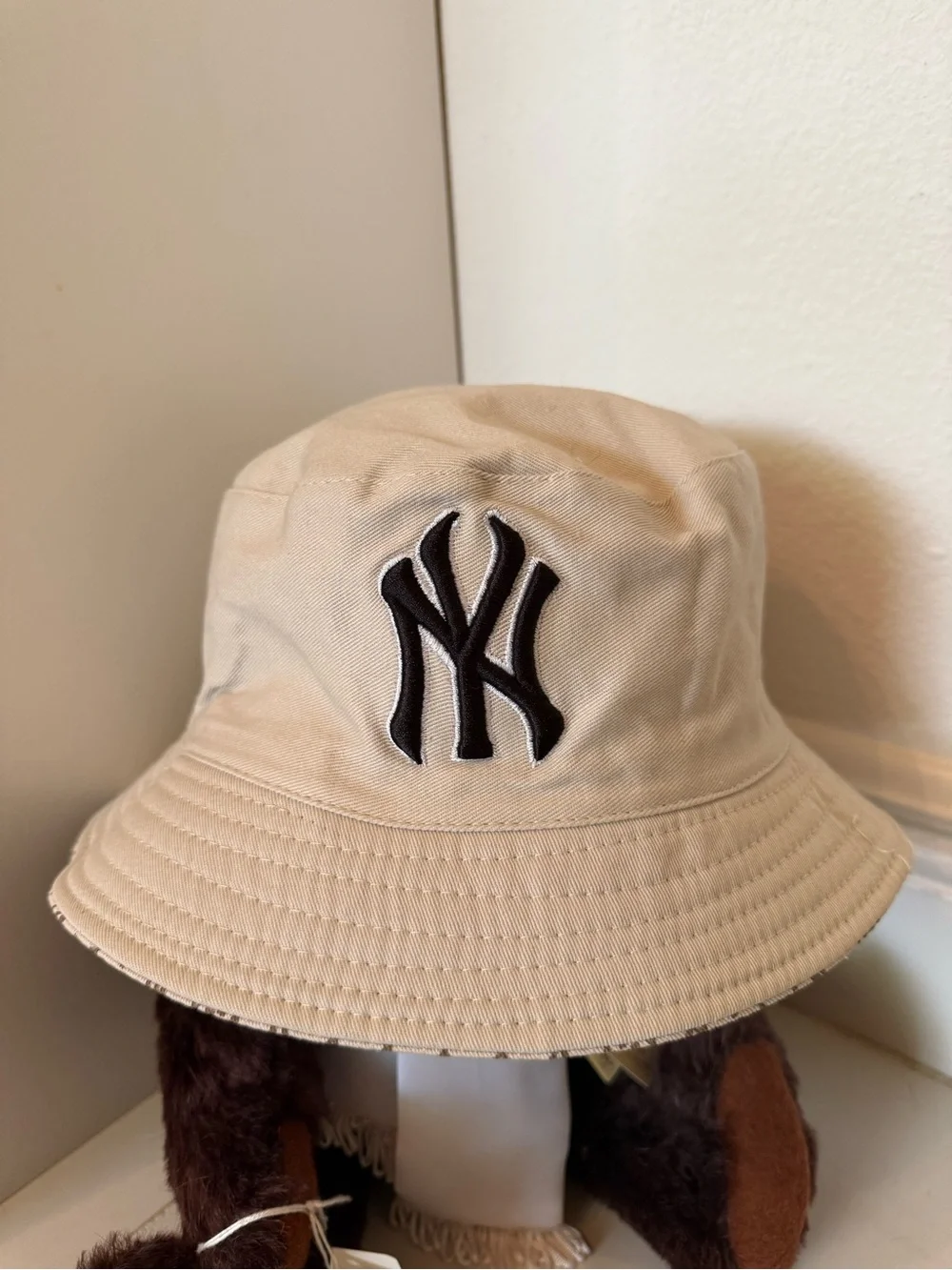 Reversible NY Yankees Monogram Bucket Hat with Embroidered Logo